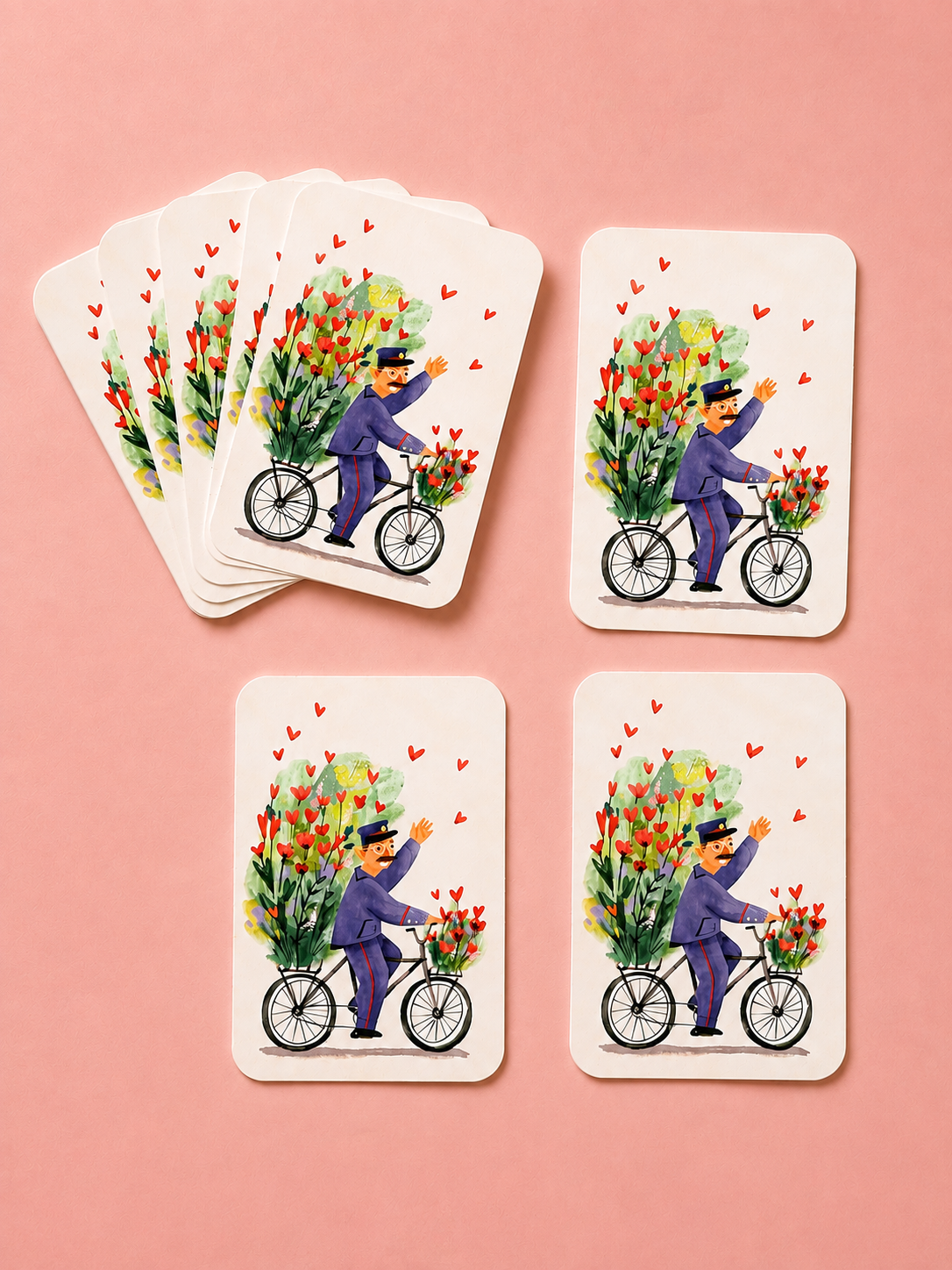 Illustrated greeting cards featuring a flower delivery man on a bicycle, arranged on a soft pink background.