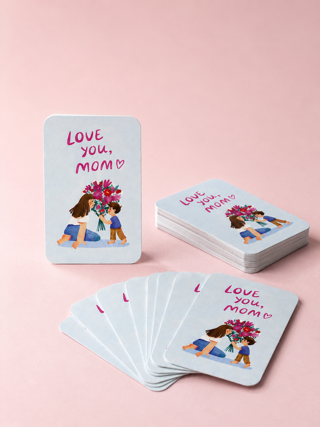 Love You Mom mini cards with mother and child illustration, arranged on a soft pink background